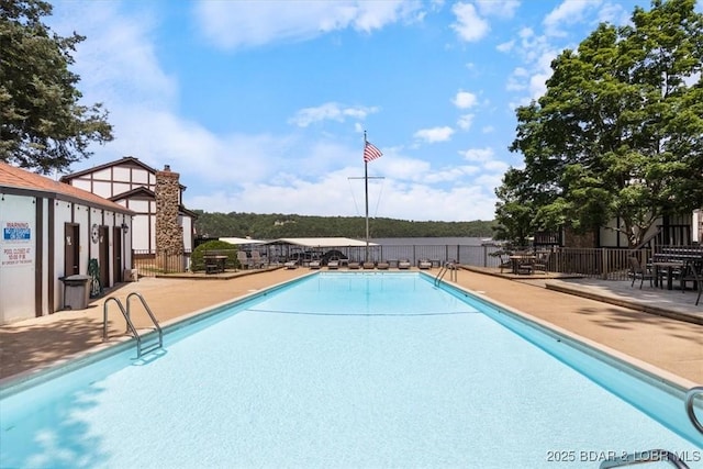 241 Shell Bay Cir Unit 1A, Linn Creek, MO 65052 - community pool featuring a patio