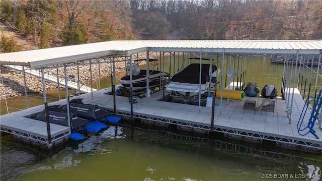 241 Shell Bay Cir Unit 1A, Linn Creek, MO 65052 - dock area with a forest view and a water view