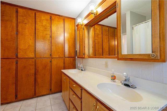 bathroom featuring double vanity and tile patterned flooring