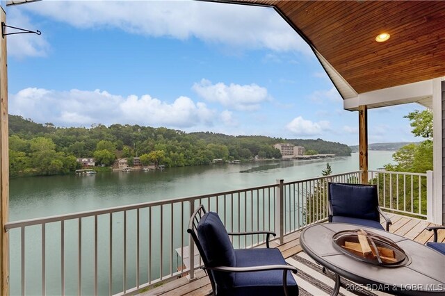205 Wedge Wood Dr, Camdenton, MO 65020 - balcony featuring a fire pit and a water view