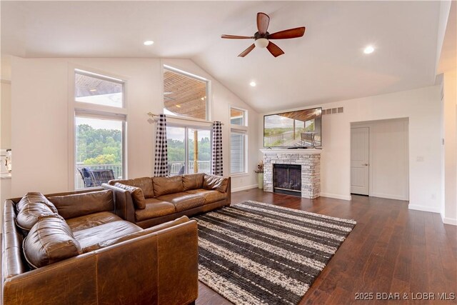 205 Wedge Wood Dr, Camdenton, MO 65020 - living room featuring a ceiling fan, lofted ceiling, a fireplace, dark wood-style floors, and baseboards