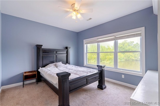 205 Wedge Wood Dr, Camdenton, MO 65020 - bedroom with baseboards, light colored carpet, and a ceiling fan