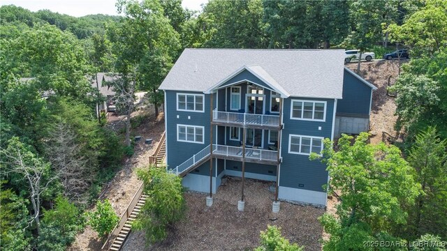 205 Wedge Wood Dr, Camdenton, MO 65020 - back of house featuring stairs, a balcony, and roof with shingles