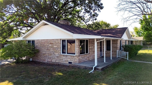 577 Mulberry Ln, Camdenton, MO 65020 - view of side of property featuring a porch, a lawn, a chimney, stone siding, and roof with shingles