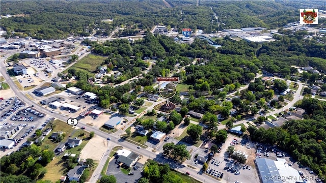 577 Mulberry Ln, Camdenton, MO 65020 - aerial view of property and surrounding area featuring a heavily wooded area