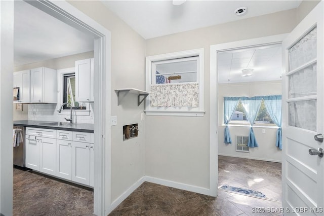 577 Mulberry Ln, Camdenton, MO 65020 - laundry room with baseboards