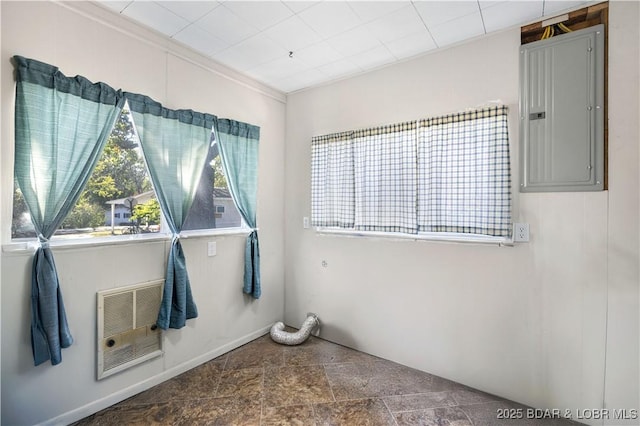 577 Mulberry Ln, Camdenton, MO 65020 - empty room with electric panel, heating unit, stone finish floors, and baseboards