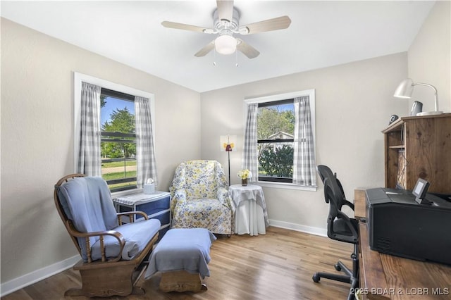 577 Mulberry Ln, Camdenton, MO 65020 - home office featuring baseboards, wood finished floors, and ceiling fan