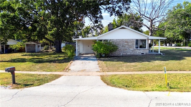 577 Mulberry Ln, Camdenton, MO 65020 - view of front of house with asphalt driveway, a chimney, stone siding, and a front lawn