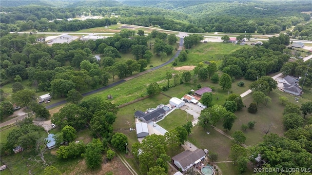 312 Charger Dr, Macks Creek, MO 65786 - aerial view of property's location featuring a heavily wooded area and rural landscape