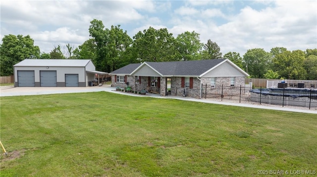 312 Charger Dr, Macks Creek, MO 65786 - view of front of property featuring a detached garage, an outdoor structure, and covered porch