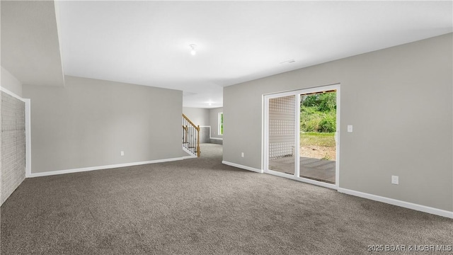 103 Primrose Ln, Camdenton, MO 65020 - spare room featuring carpet, baseboards, and stairs
