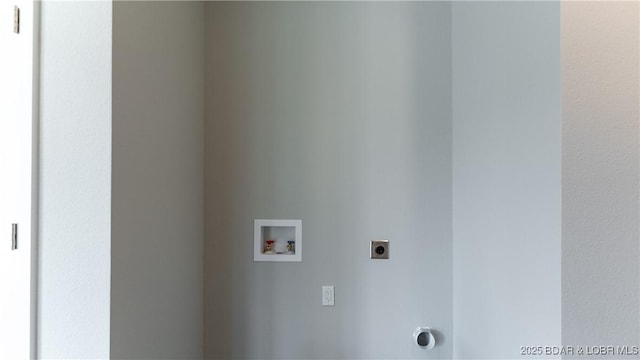 103 Primrose Ln, Camdenton, MO 65020 - laundry area featuring electric dryer hookup and hookup for a washing machine