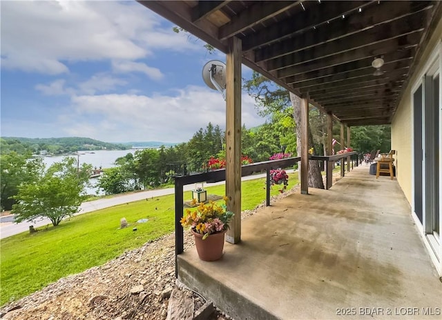 73 Good Neighbors Loop, Camdenton, MO 65020 - view of patio / terrace featuring a water view