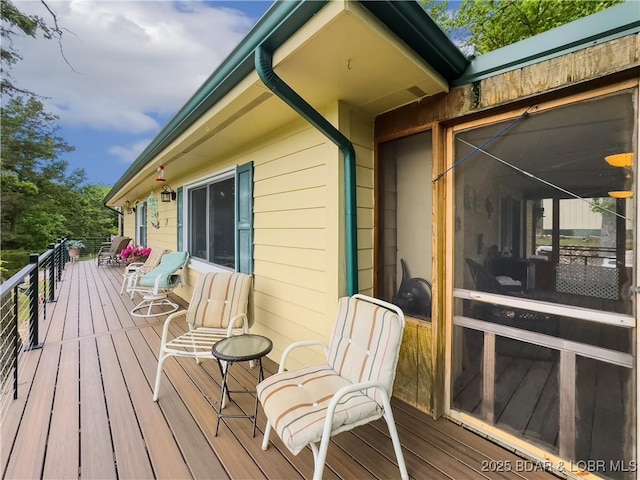 73 Good Neighbors Loop, Camdenton, MO 65020 - wooden deck with a sunroom