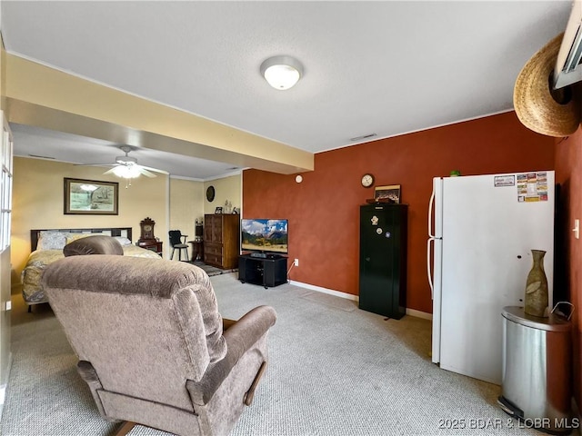 73 Good Neighbors Loop, Camdenton, MO 65020 - living area featuring light carpet, ceiling fan, baseboards, and an AC wall unit