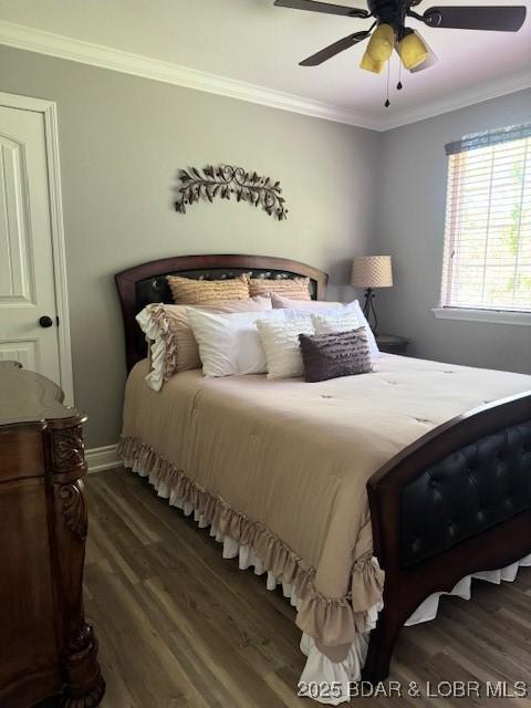 362 Merlin Dr, Camdenton, MO 65020 - bedroom with wood finished floors, crown molding, ceiling fan, and baseboards