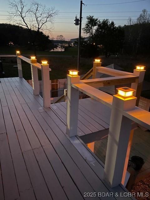 362 Merlin Dr, Camdenton, MO 65020 - view of deck at dusk