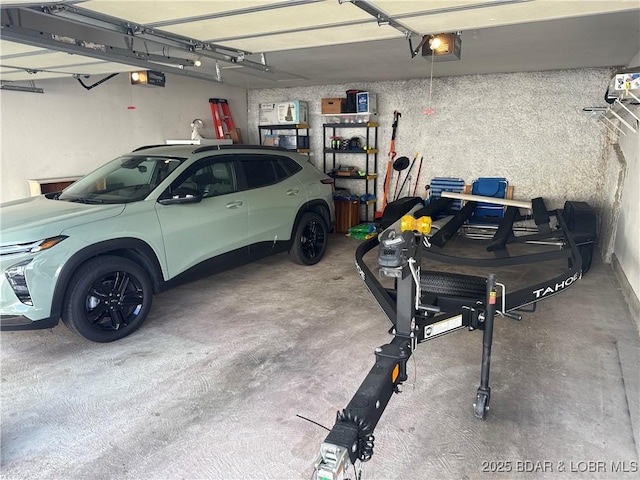 1089 Buckingham Dr Unit 1, Camdenton, MO 65020 - garage featuring a garage door opener