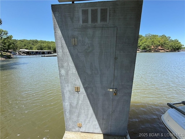 1089 Buckingham Dr Unit 1, Camdenton, MO 65020 - dock featuring a water view