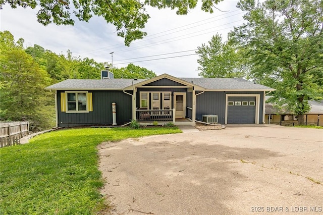 138 Siesta Cir, Camdenton, MO 65020 - single story home featuring covered porch, a garage, driveway, and central air condition unit