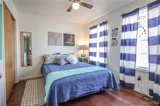 138 Siesta Cir, Camdenton, MO 65020 - bedroom with baseboards, wood finished floors, and a ceiling fan