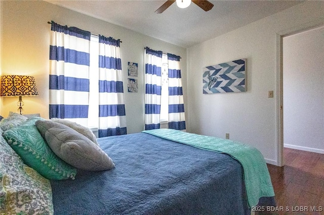 138 Siesta Cir, Camdenton, MO 65020 - bedroom featuring baseboards, wood finished floors, and a ceiling fan