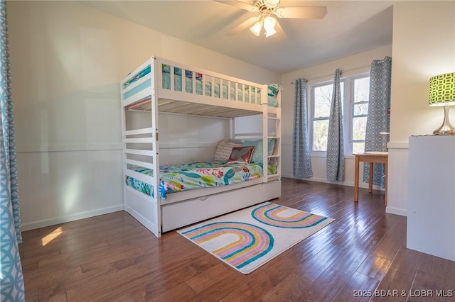 138 Siesta Cir, Camdenton, MO 65020 - bedroom featuring wood finished floors, baseboards, and ceiling fan