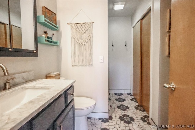138 Siesta Cir, Camdenton, MO 65020 - bathroom featuring toilet, vanity, and tile patterned flooring