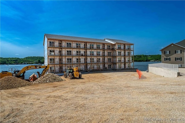 290 Plaza Beach Dr Unit 4D, Camdenton, MO 65020 - view of building exterior with a water view