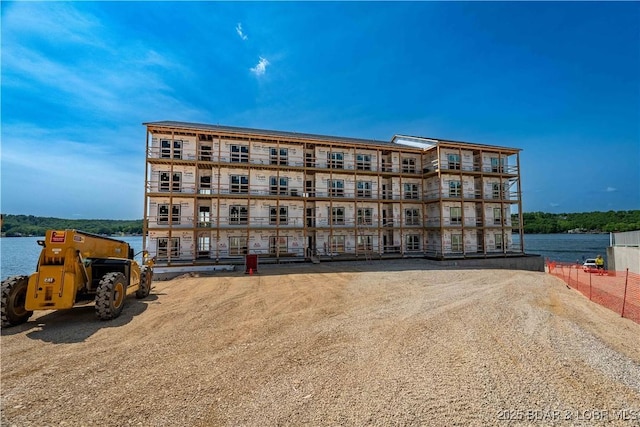 290 Plaza Beach Dr Unit 4D, Camdenton, MO 65020 - view of apartment building / complex featuring a water view