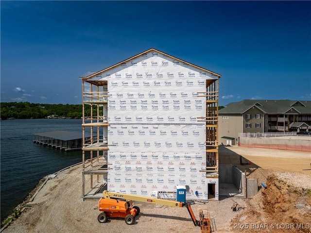 290 Plaza Beach Dr Unit 4D, Camdenton, MO 65020 - view of building exterior featuring a water view
