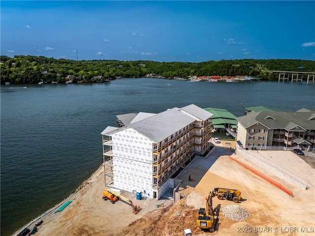 290 Plaza Beach Dr Unit 4D, Camdenton, MO 65020 - drone / aerial view of a nearby body of water and a forest