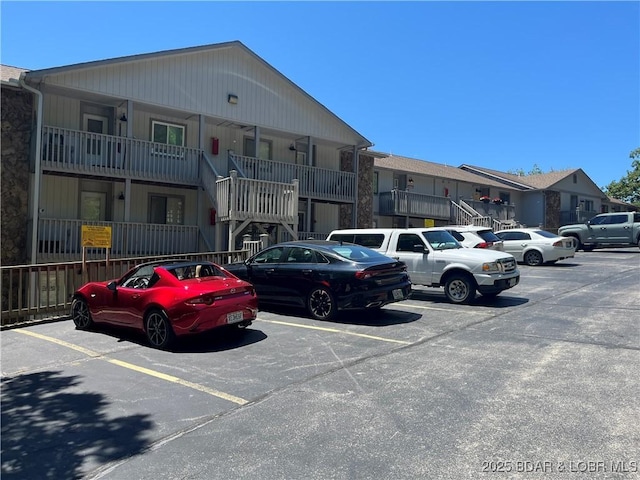 1130 Rachel Rd Unit 108, Osage Beach, MO 65065 - view of building exterior with uncovered parking