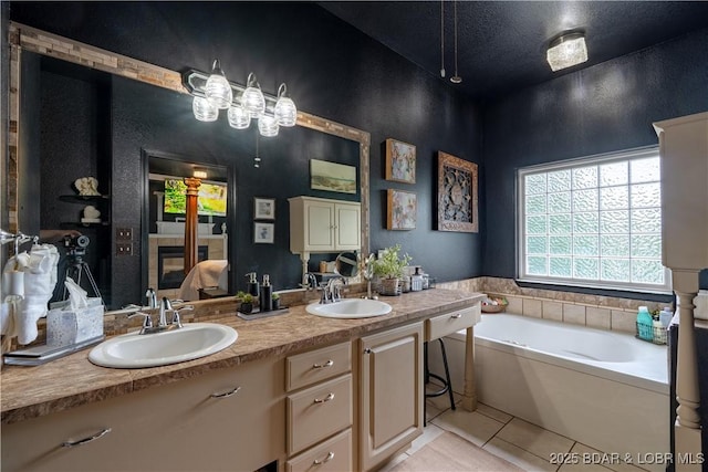 179 Regency Cove Dr, Lake Ozark, MO 65049 - bathroom with tile patterned floors, a bath, and double vanity
