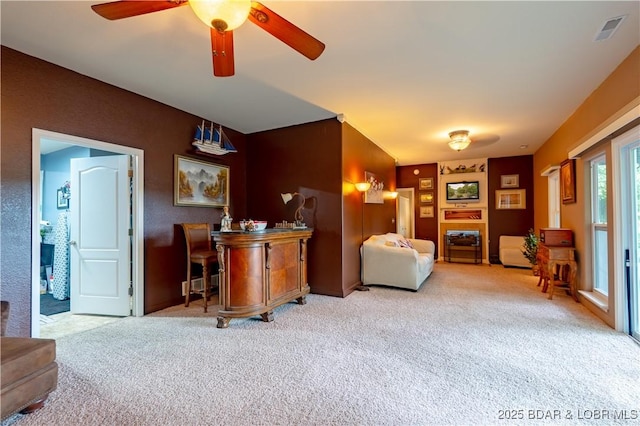 179 Regency Cove Dr, Lake Ozark, MO 65049 - carpeted living area with a ceiling fan