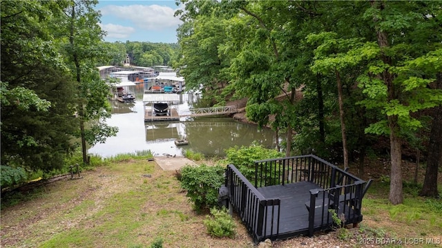 179 Regency Cove Dr, Lake Ozark, MO 65049 - view of yard featuring a water view and a boat dock