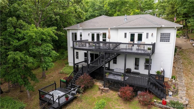 179 Regency Cove Dr, Lake Ozark, MO 65049 - back of house featuring stairs, french doors, a wooden deck, and a shingled roof