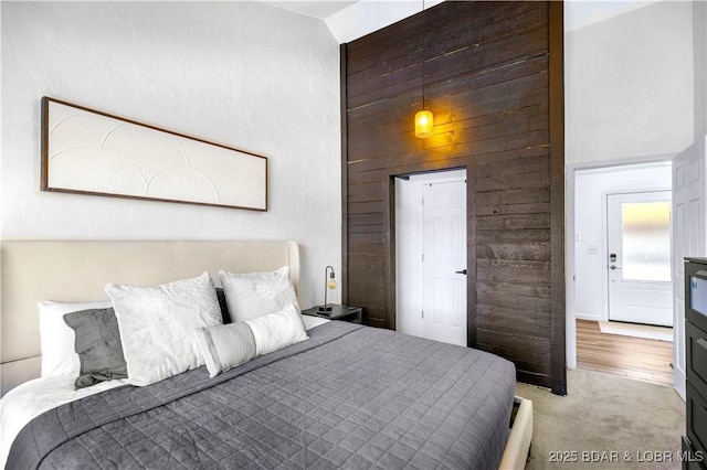 855 Ginger Rd, Lake Ozark, MO 65049 - carpeted bedroom with high vaulted ceiling