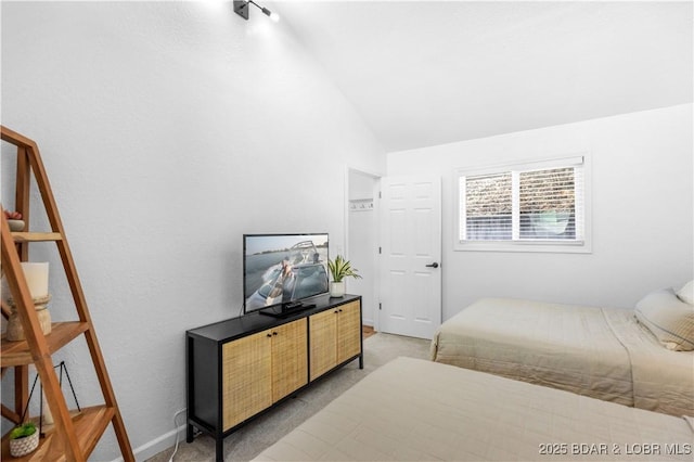 855 Ginger Rd, Lake Ozark, MO 65049 - bedroom featuring lofted ceiling and light colored carpet
