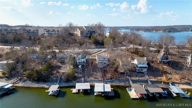 855 Ginger Rd, Lake Ozark, MO 65049 - aerial perspective of suburban area featuring a nearby body of water