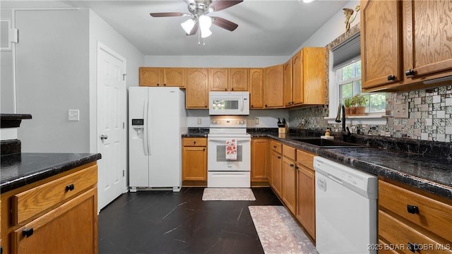 119 Camelot Dr, Camdenton, MO 65020 - kitchen with white appliances, a sink, a ceiling fan, tasteful backsplash, and brown cabinets