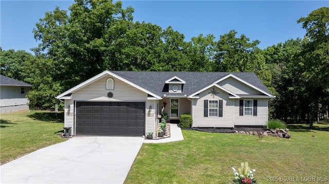 119 Camelot Dr, Camdenton, MO 65020 - view of front of property featuring a garage, driveway, a front lawn, and a shingled roof