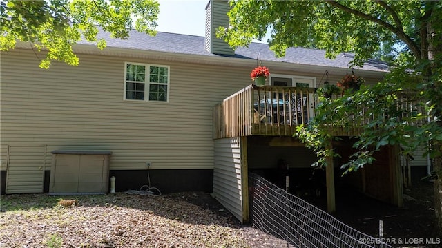 119 Camelot Dr, Camdenton, MO 65020 - back of property with a chimney