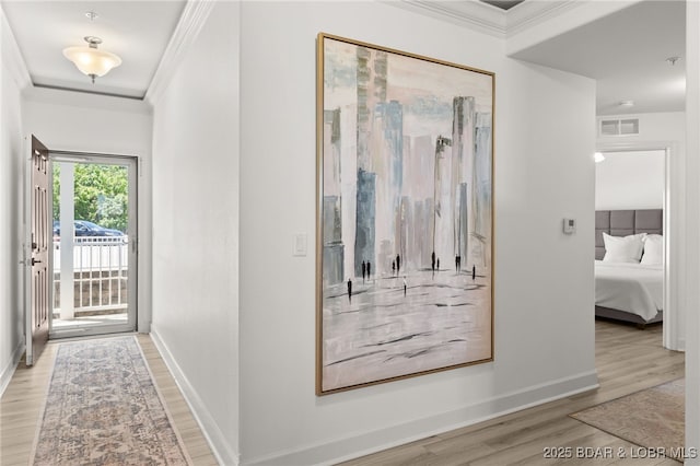 100 Trinity Pointe Dr Unit 4M, Camdenton, MO 65020 - hall with wood finished floors, ornamental molding, and baseboards