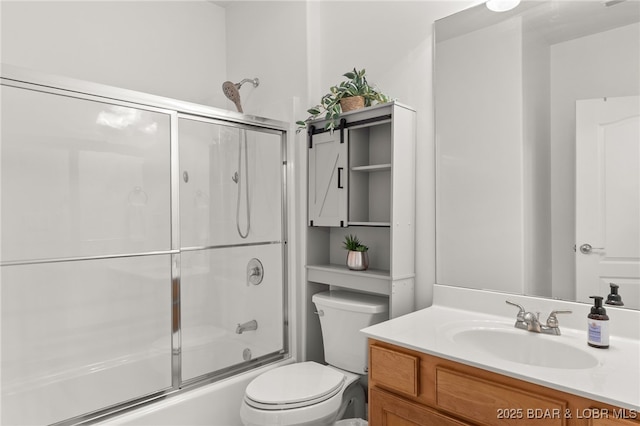 100 Trinity Pointe Dr Unit 4M, Camdenton, MO 65020 - bathroom featuring vanity, enclosed tub / shower combo, and toilet