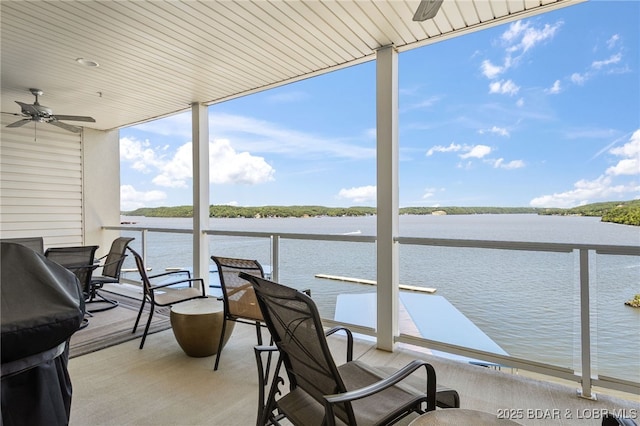 100 Trinity Pointe Dr Unit 4M, Camdenton, MO 65020 - view of patio featuring a water view, a ceiling fan, and area for grilling