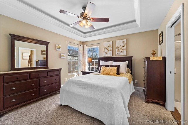 790 College Blvd, Osage Beach, MO 65065 - bedroom featuring a tray ceiling, light colored carpet, ceiling fan, and crown molding