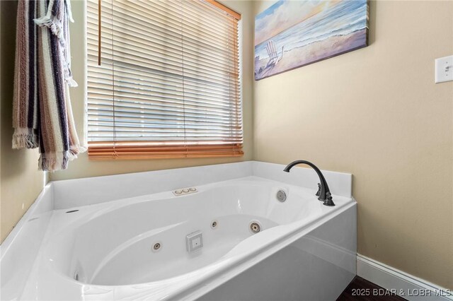 790 College Blvd, Osage Beach, MO 65065 - full bathroom featuring a tub with jets
