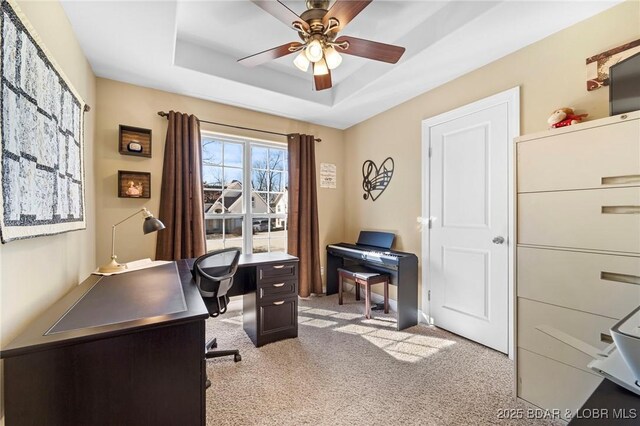 790 College Blvd, Osage Beach, MO 65065 - carpeted office space featuring a raised ceiling and ceiling fan